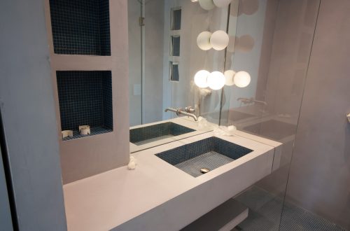 bathroom with micro cement topping sink