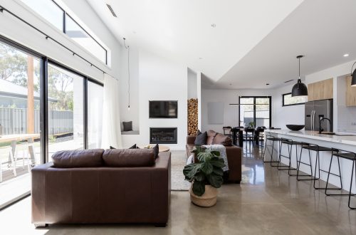 living room with polished concrete flooring by floortex industries
