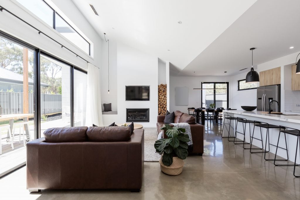 living area with polished concrete by floortex industries