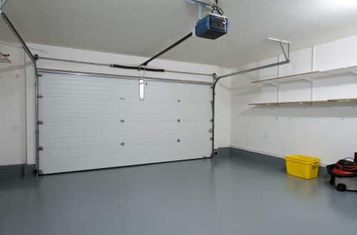 garage and working area with seamless epoxy flooring by floortex industries