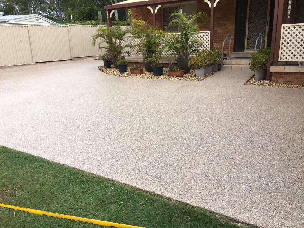 Epoxy-coated concrete driveway by Floortex Industries